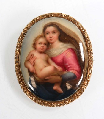 Lot 571 - An oval brooch depicting the Madonna and child...