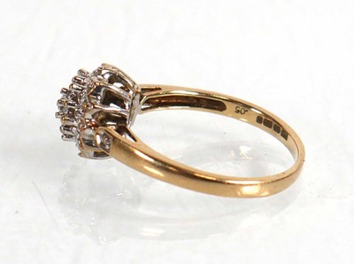 Lot 573 - A 9ct yellow gold cluster ring set small...