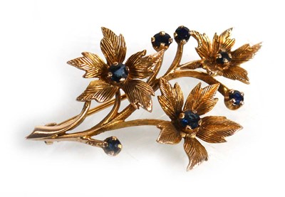 Lot 585 - A 9ct yellow gold brooch of bouquet design set...