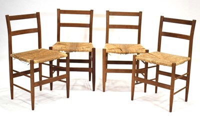 Lot 45 - A set of four 1960/70's teak framed dining...