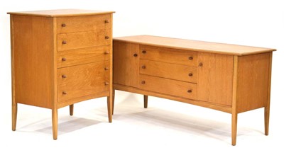 Lot 48 - A 1970's oak bow-fronted chest of five drawers,...