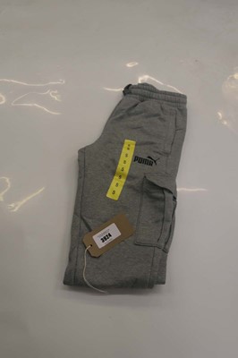 Lot 3924 - A bag containing 7 pairs of Puma joggers