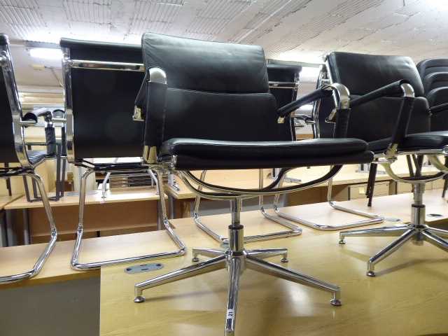 Lot 21 - Eames style black soft pad swivel chair with...