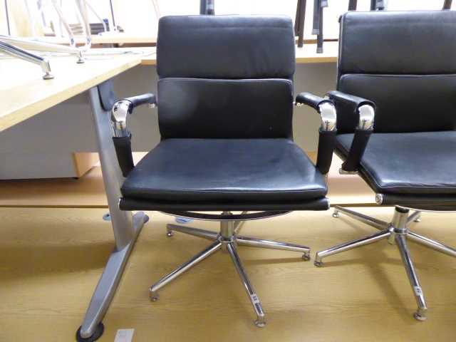 Lot 23 - Eames style black soft pad swivel chair with...