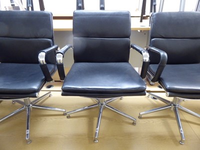 Lot 24 - Eames style black soft pad swivel chair with...