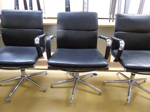 Lot 26 - Eames style black soft pad swivel chair with...