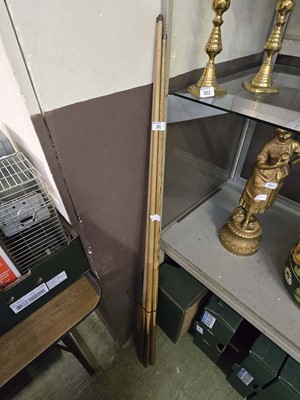 Lot 301 - Four pool cues of varying size