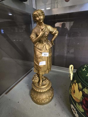 Lot 307 - A gilt painted metalwork figure of a lady...