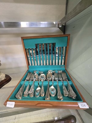 Lot 324 - A six plate canteen of King's pattern flatware