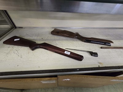 Lot 325 - Two 20th century air rifle stocks along with...