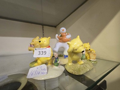 Lot 339 - Four Royal Doulton 'Winnie The Pooh' figurines...