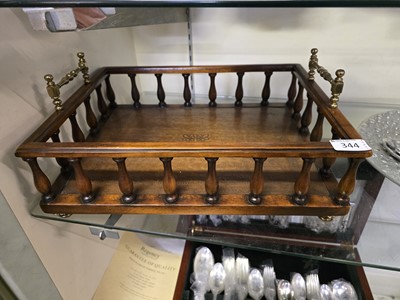 Lot 344 - An oak galleried twin brass handled tea tray...