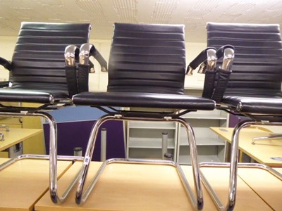 Lot 39 - 5 Eames style black ribbed cantilever chairs
