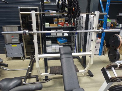 Lot 3009 - Incline bench plus Olympic bar and spotting plate