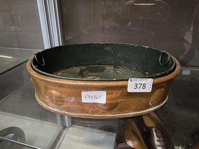 Lot 378 - A copper basin with black painted metal inner...