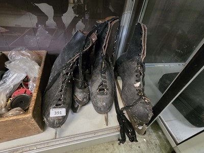 Lot 391 - two pairs of 20th century ice skates