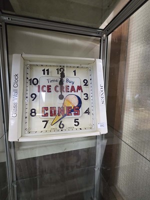 Lot 392 - A boxed Jones Clocks glass wall clock 'Time To...