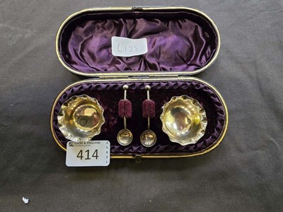 Lot 414 - A silver hallmarked salts set contained in...