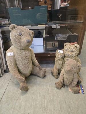 Lot 5 - Three weathered stoneware garden teddy bears