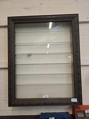 Lot 8 - A glazed glass shelved wall mounted display...