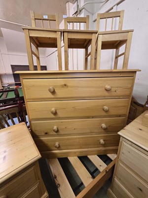 Lot 28 - A modern pine chest of four long drawers