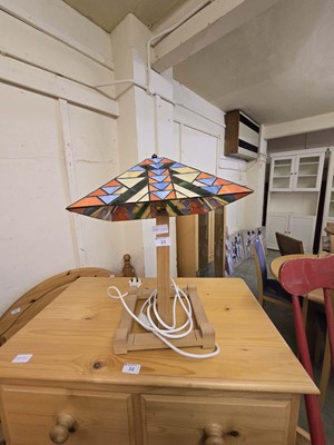 Lot 33 - A Tiffany style table lamp on hand crafted...