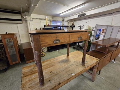 Lot 45 - An early 20th century waxed pine two drawer table