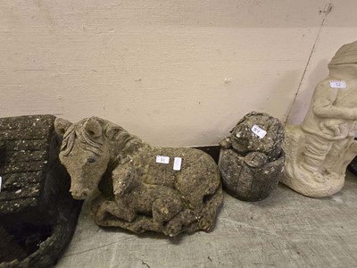 Lot 51 - A weathered stoneware statue of mare and foal...