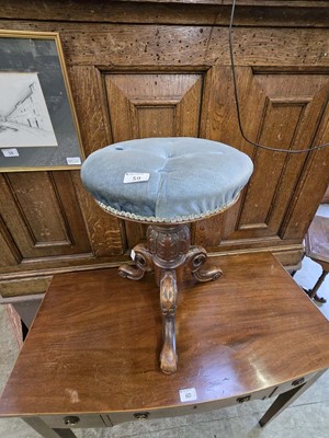 Lot 59 - A Victorian carved mahogany music stool