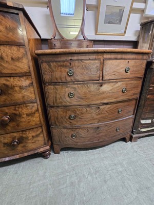 Lot 74 - A late 19th century mahogany bow fronted chest...