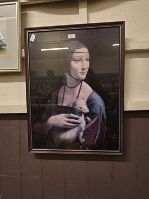 Lot 85 - A framed and glazed French print of lady with...