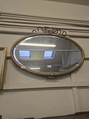 Lot 89 - A late 19th century gilt oval wall mirror