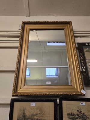 Lot 93 - A rectangular gilt painted wall mirror