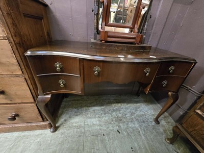 Lot 97 - A reproduction mahogany serpentine fronted...