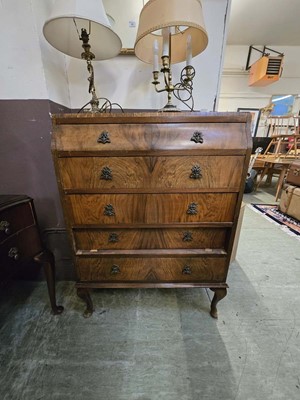 Lot 100 - An early 20th century walnut veneered chest of...