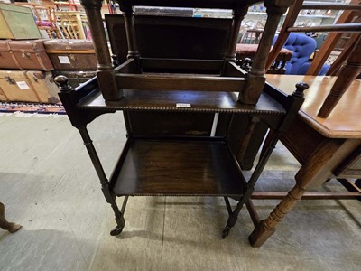 Lot 103 - A mid-20th century oak two tier tea trolley