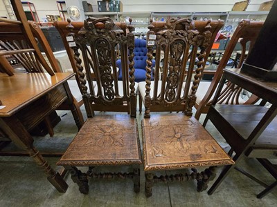 Lot 106 - A pair of early 20th century carved oak hall...