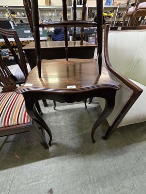 Lot 115 - An early 20th century mahogany scalloped sided...