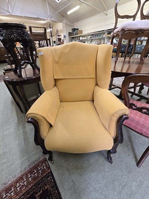 Lot 119 - A 19th century mahogany framed wing armchair...