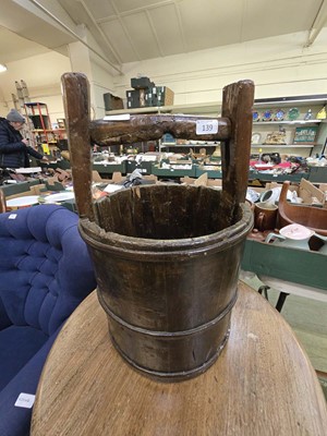 Lot 139 - A reproduction wooden peat bucket