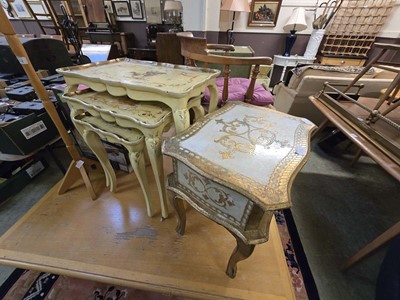 Lot 151 - A nest of three painted occasional tables...