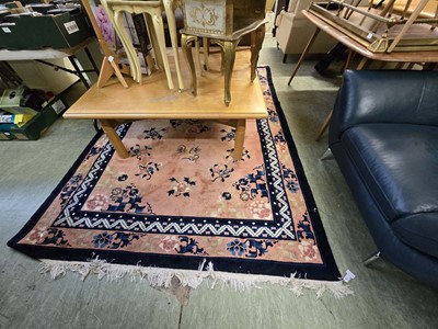 Lot 153 - A Chinese blue and peach rectangular rug