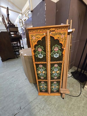 Lot 176 - A reproduction floral decorated two door CD...