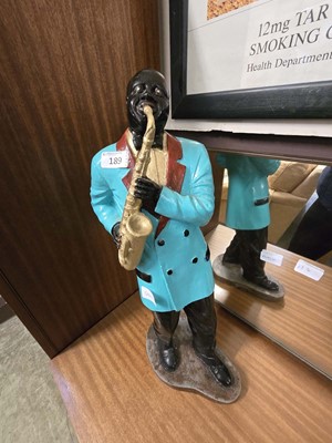 Lot 189 - A moulded figure of jazz saxophonist