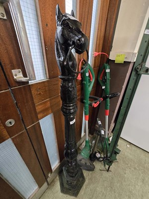 Lot 197 - A black painted cast metal hitching post with...