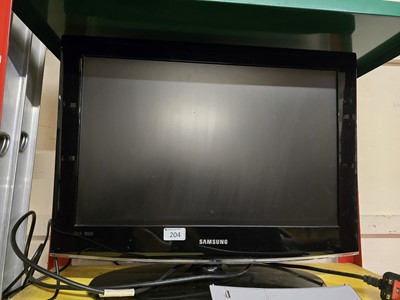 Lot 204 - A Samsung TV with remote