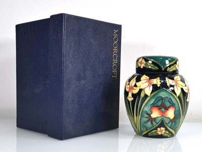 Lot 306 - A Moorcroft jar and cover decorated in the...