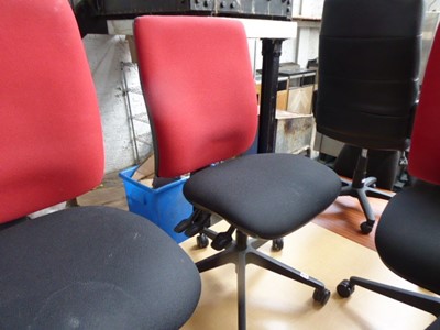 Lot 218 - Red and black cloth swivel chair