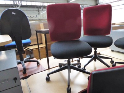 Lot 225 - Red and black cloth swivel chair