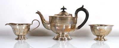 Lot 388 - An early 20th century silver three piece tea...